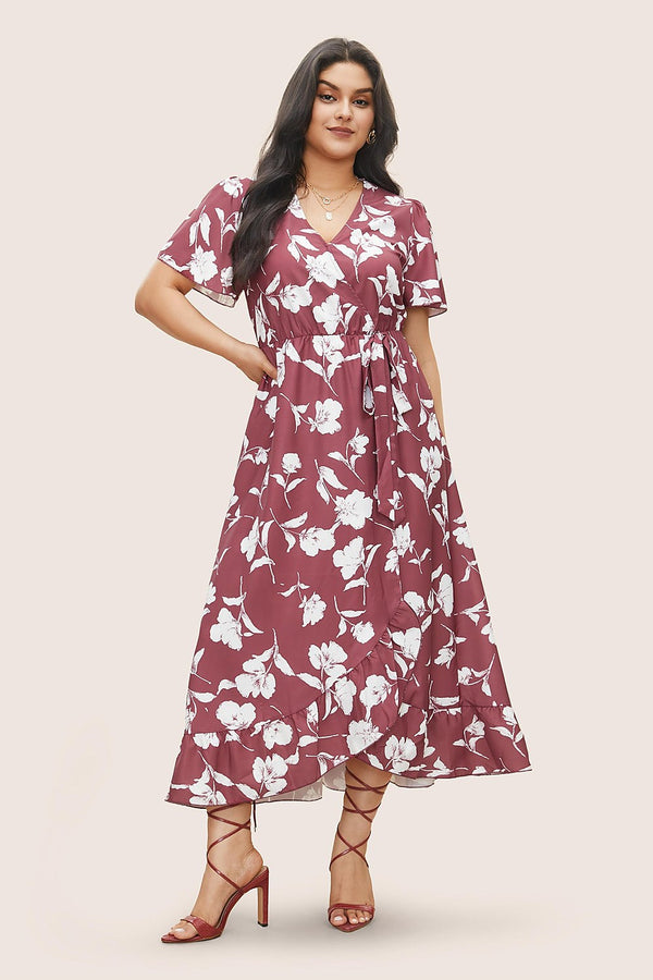 Marigold Ruffle Wrap Midi Dress in Dusty Pink – front, hand in pocket